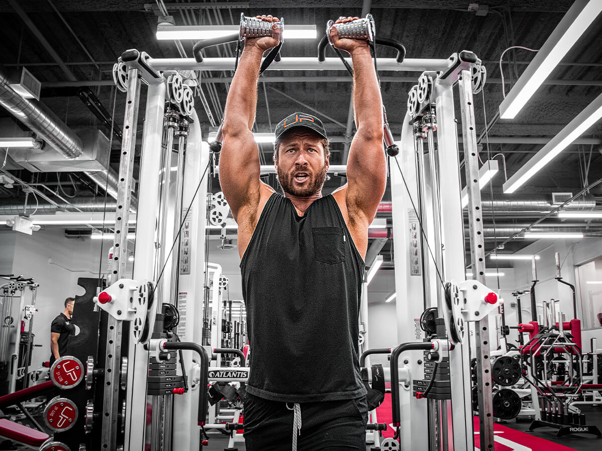 Glen Powell workout with cable machine